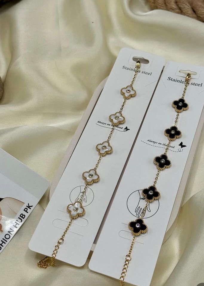 Floral Charm Bracelet – Black & White Enamel Elegance | FashionHubPK7