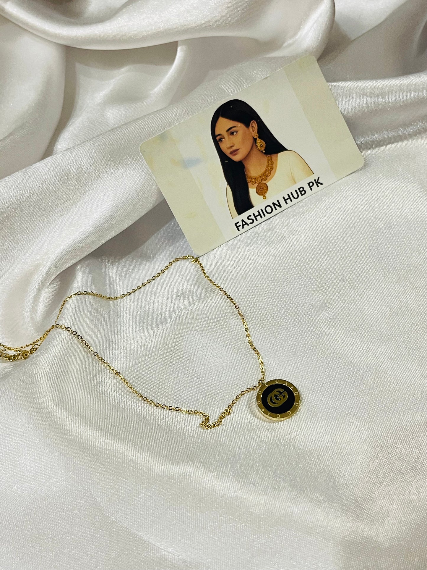 Elegant Clover Pendant Necklace – Gold with Black & White Enamel | FashionHubPK7