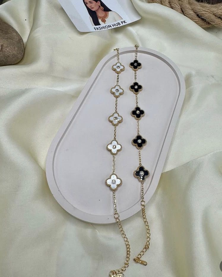 Floral Charm Bracelet – Black & White Enamel Elegance | FashionHubPK7