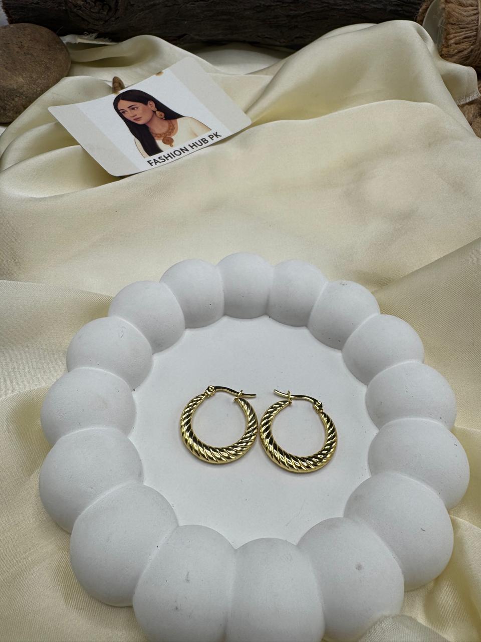 Golden Twist Hoops – Elegant Lightweight Gold Earrings for Everyday & Party Wear | FashionHubPK7