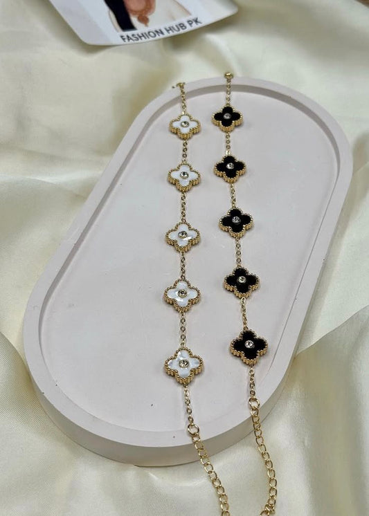 Floral Charm Bracelet – Black & White Enamel Elegance | FashionHubPK7