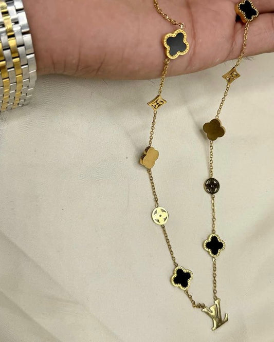 Luxe Clover & LV Charm Necklace – Gold-Tone Stainless Steel | Fashion Hub PK